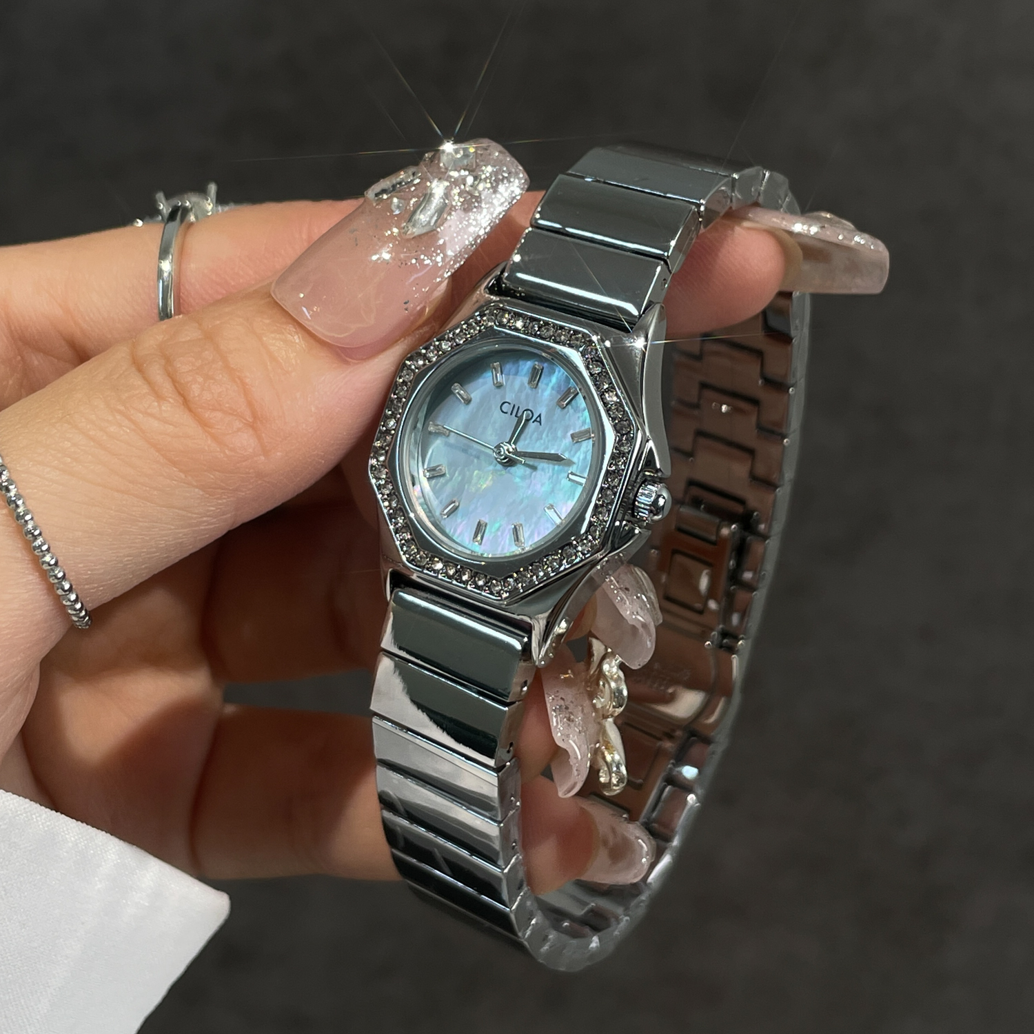 Luxury Watch Values - CILOA round blue watch female art